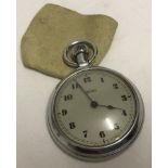 A vintage Smiths chrome cased pocket watch in working order.