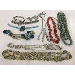 A collection of assorted beaded jewellery to include branch coral and marcasite.