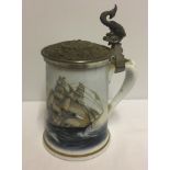 A large ceramic lidded tankard. Depicting 'Greyhounds of the Sea' by Leonard Pearce.