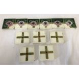 11 Art Nouveau ceramic French tiles of poppy and crazed cross design.