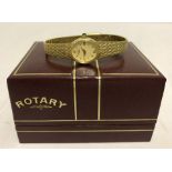 A ladies boxed gold plated Rotary watch.