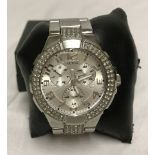 Guess watch set with crystals around the dial.