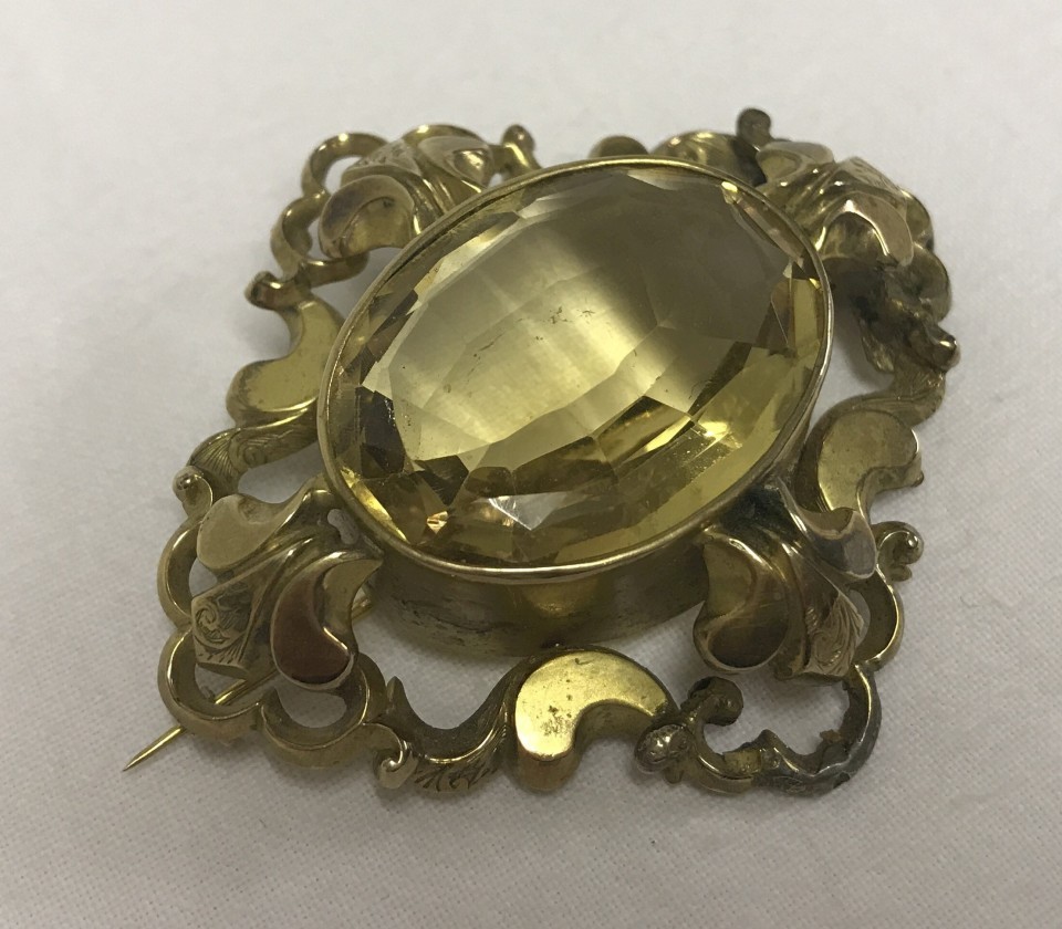 A vintage large ornate 9ct gold & citrine brooch.