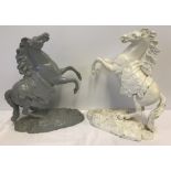 2 vintage spelter rearing horse figurines, one painted cream, one grey.