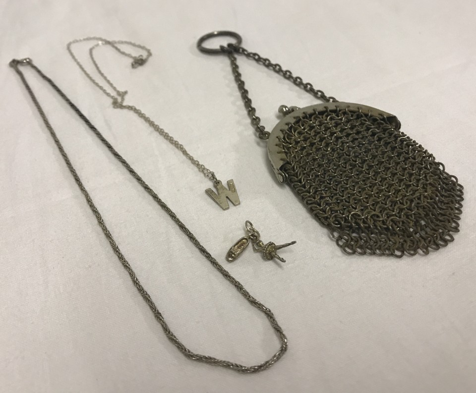 A collection of 3 silver jewellery items, together with a small white metal chain purse..