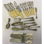 A collection of silver collared & silver plated cutlery.