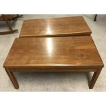 A pair of circa 1960's teak coffee / side tables.