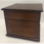 A vintage mahogany square shaped lidded box.