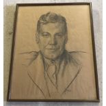 Framed & glazed charcoal portrait on brown paper signed Joyce to lower right.
