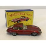 A boxed Matchbox 32 'E' Type Jaguar.