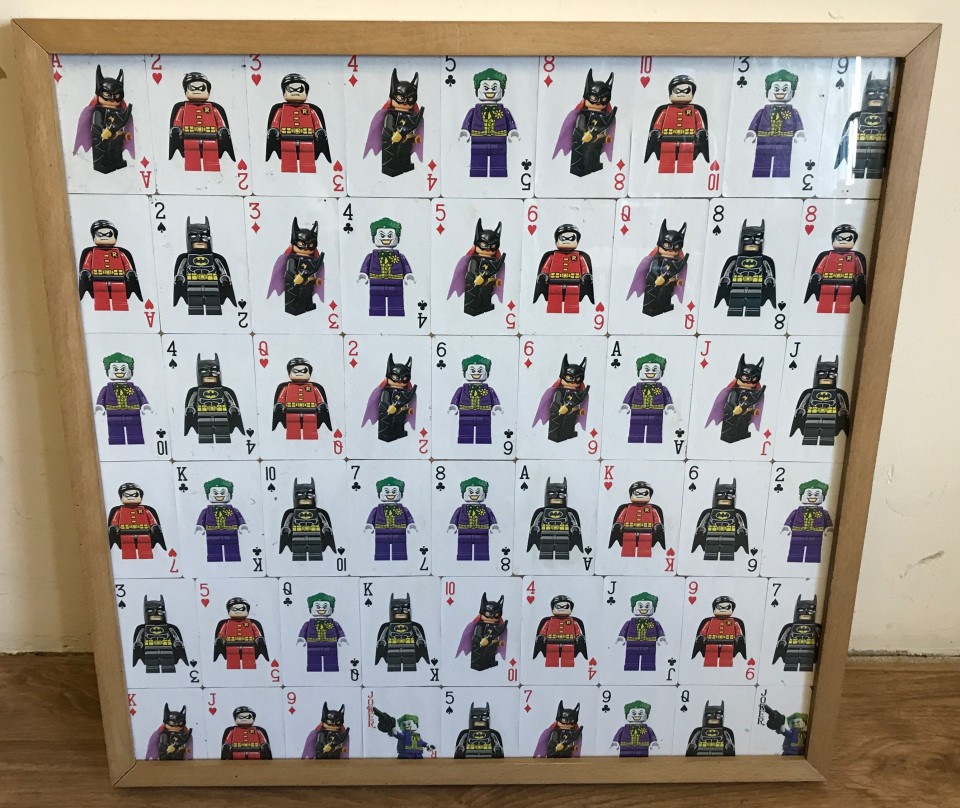 A framed and glazed montage of Lego Batman playing cards.