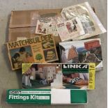 A quantity of vintage model house building kits.
