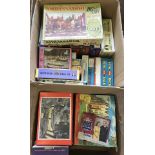 2 boxes of vintage jigsaw puzzles.