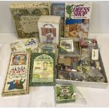 A box of assorted vintage toys, games, model railway and dolls house items.