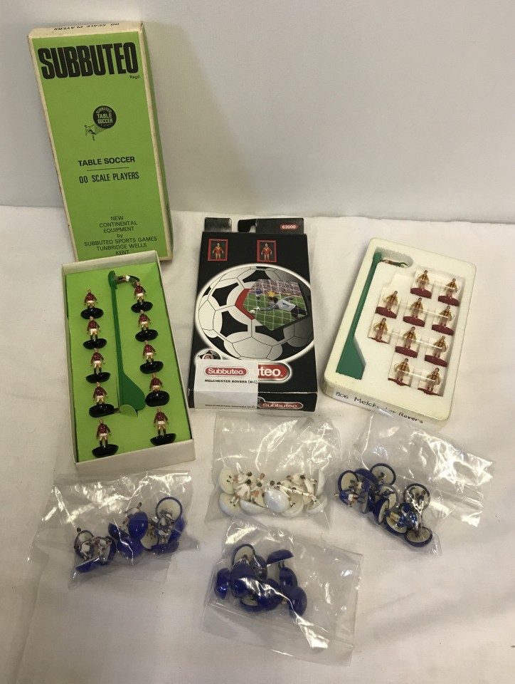3 boxed Subbuteo table football teams with 4 unboxed teams (without goalkeepers).