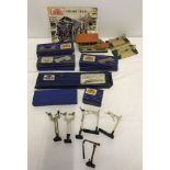 A box of boxed & unboxed Hornby Dublo track, accessories, and catalogue.