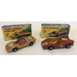 2 boxed Matchbox cars.