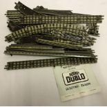 A collection of Hornby Dublo tin 3 rail track.