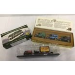 3 boxed diecast vehicle sets.