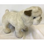 A Merrythought Bulldog soft toy.