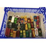 A box of play worn Matchbox cars.