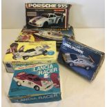 5 c1980's radio controlled vehicles.