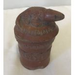 A 19th century Indian pottery lidded pot.