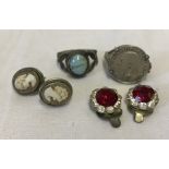 2 silver rings together with a pair of paste clip on earrings and a pair of cameo stud earrings.