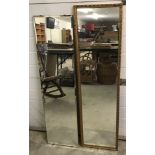 2 long wall hanging mirrors. A gilt framed mirror together with one with bevel edged glass.