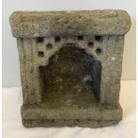 A vintage cast stone 'offering altar'.