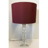 An modern Art Deco style clear crystal lamp base.