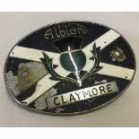 A vintage metal badge from Albion Claymore Lorry, circa 1950's.