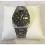 A mens Seiko automatic wristwatch.