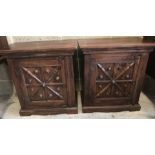 A pair of rubber wood cabinets with starburst design to door fronts.