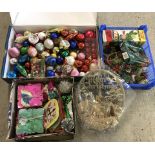 A quantity of vintage christmas tree decorations to include baubles and paper hanging decorations.
