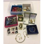 A good quantity of costume jewellery and watches.