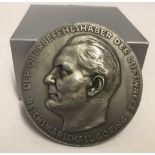 A German WWII pattern Luftwaffe Design Award medallion.