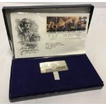A cased Bicentennial silver Ingot together with First Day Cover from 1976.