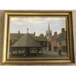 A gilt framed watercolour of Oakham town centre by S.G.Harris.