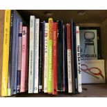 A box of books relating to art, style and design.