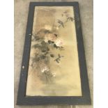 A large vintage framed and glazed watercolour on silk depicting birds, flowers and leaves.