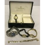 A small green watch/jewellery box with 4 ladies watches and a gold filled Ladyfair watch bracelet.