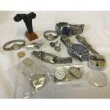 A small collection of wristwatches and watch parts to include Emporio Armani.