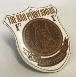 Circa 1960's Enamel "Bad Penny Award" badge.