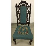 Mahogany bedroom chair with barley twist columns and carved decoration to back. Tapestry upholstery.