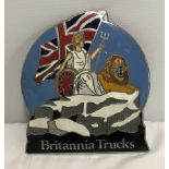 A vintage "Britannia Trucks" lorry mascot / badge.