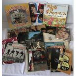A quantity of assorted Beatles records, magazines and memorabilia.