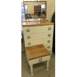 A retro 5 drawer solid wood chest of drawers with mirror top.