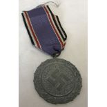 German WWII pattern medal. Fur Verdienste Im Luftshutz.