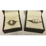 2 ladies silver opal set dress rings.